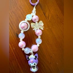 Phone charm, bag charm.